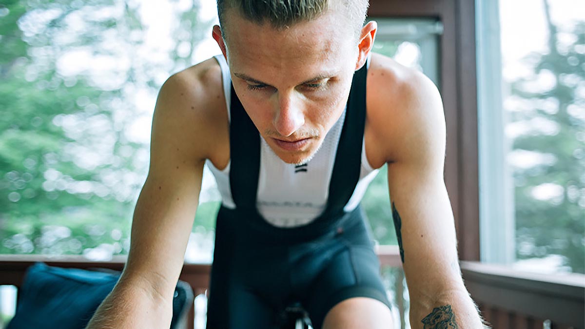 Tight Photo Of A Male Cyclist On An Indoor Trainer