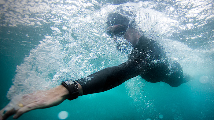 Image Of A Swimmer Using A Heart Rate Monitor To Track His Hrv And Prevent Overtraining