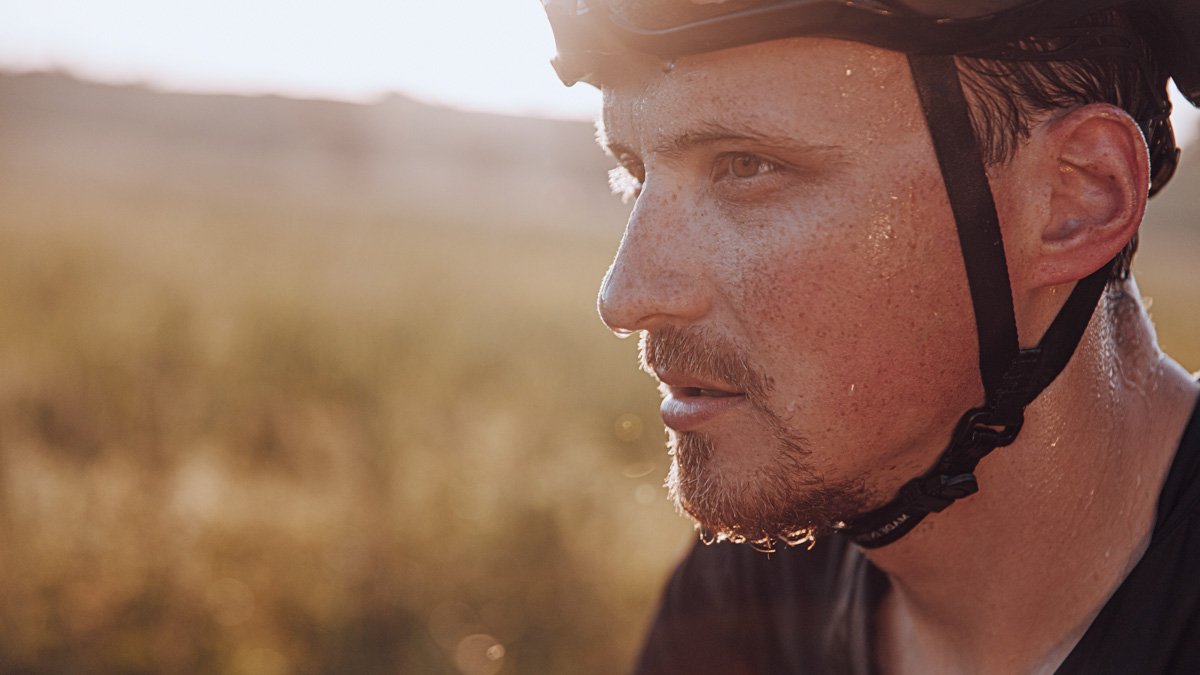 Portrait Of Bearded Cyclist With Drops Of Sweat On Face