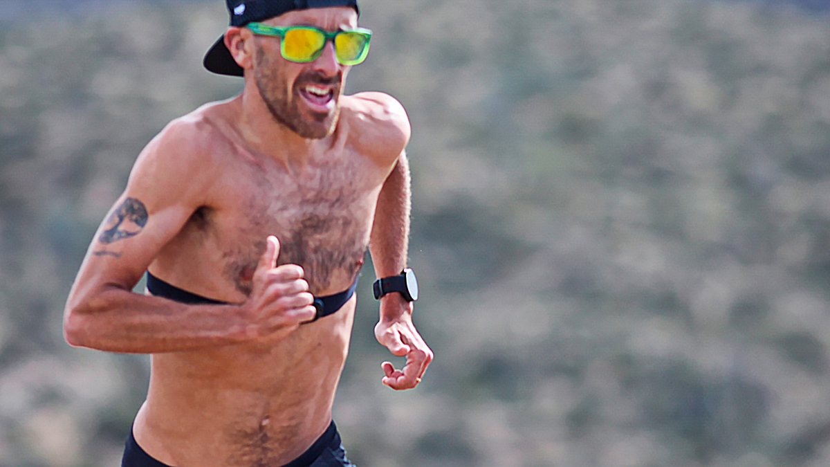 A Runner With A Heart Rate Monitor Completes A Run For His Polarized Training Program