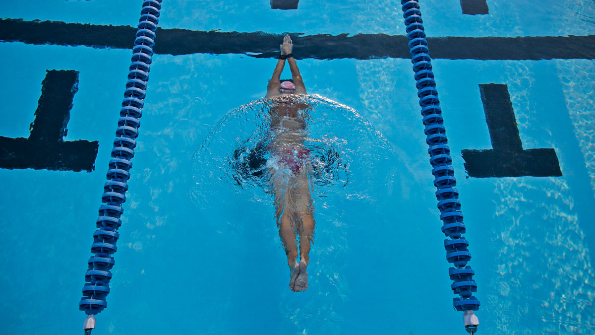 Aerial Photo Of A Female Athlete Swimming In A Pool Lane