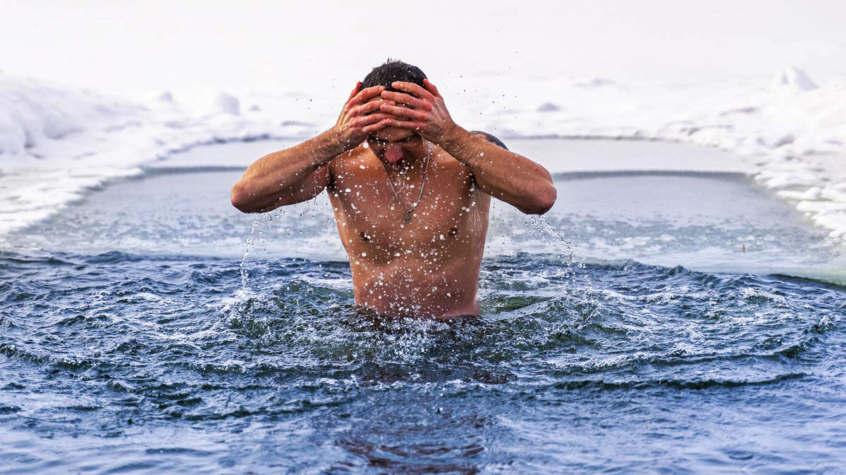 Image Of A Fit Man In A Cold Pool While Doing Contrast Therapy