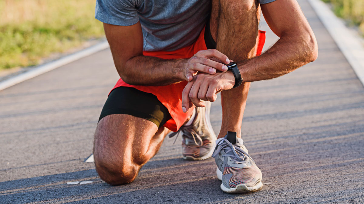 Runner Checking Their Smart Watch After A Run