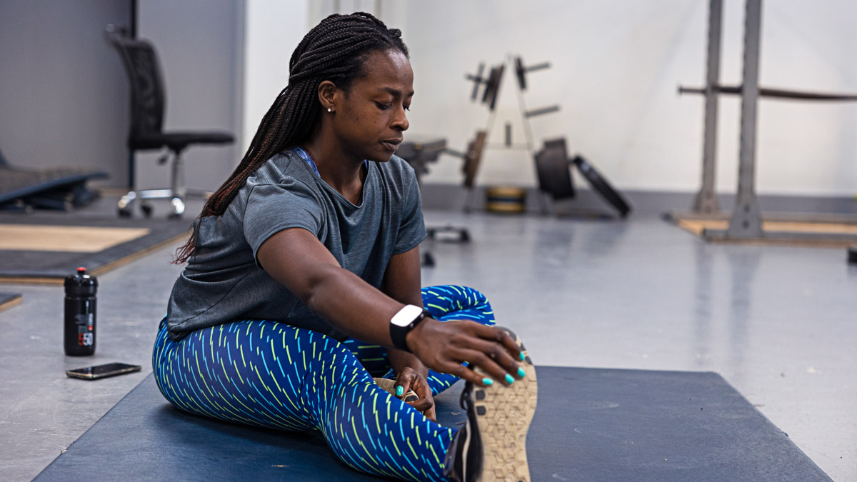 Trainingpeaks Ambassador Yewande Adesida Stretches As Part Of Her Post Race Recovery Routine