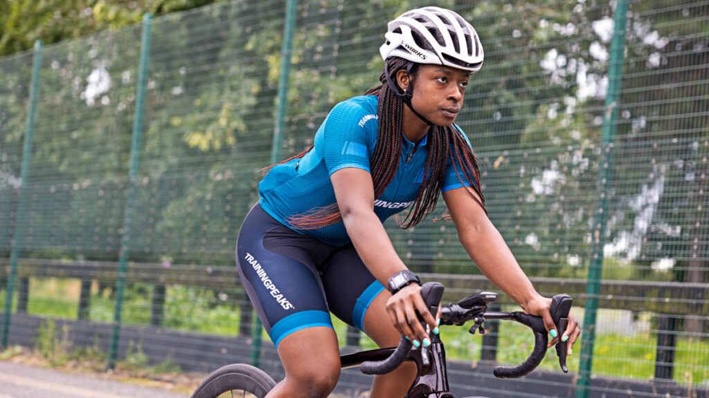 TrainingPeaks Ambassador Yewande Adesida on a bike doing aerobic training for endurance racing