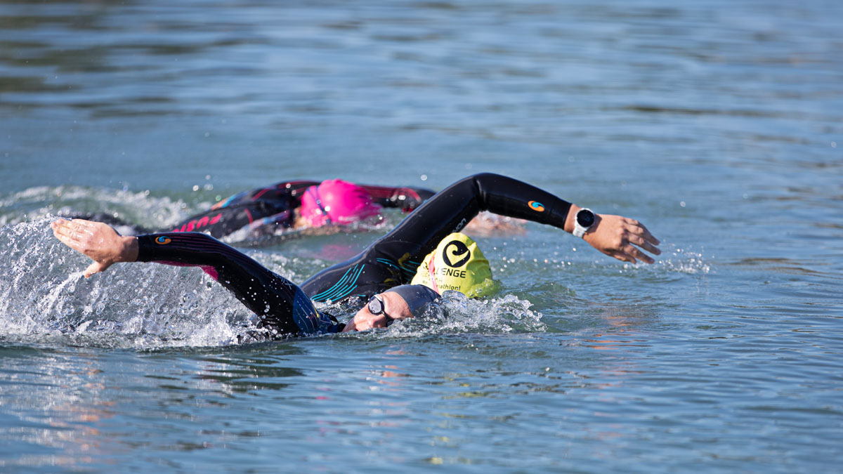 Image Of A Swimmer In Wetsuit In Open Water Completing A Workout From A Top Triathlon Training Plan From Trainingpeaks