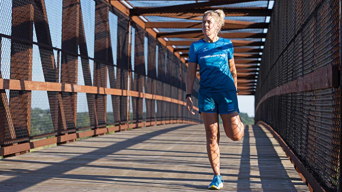 Image Of Trainingpeaks Coach Christine Schirtzinger On A Bridge Warming Up For Running Talking About Dealing With Sexual Assault