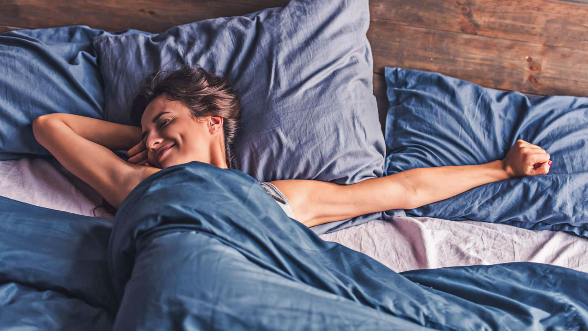 Young Woman In Bed