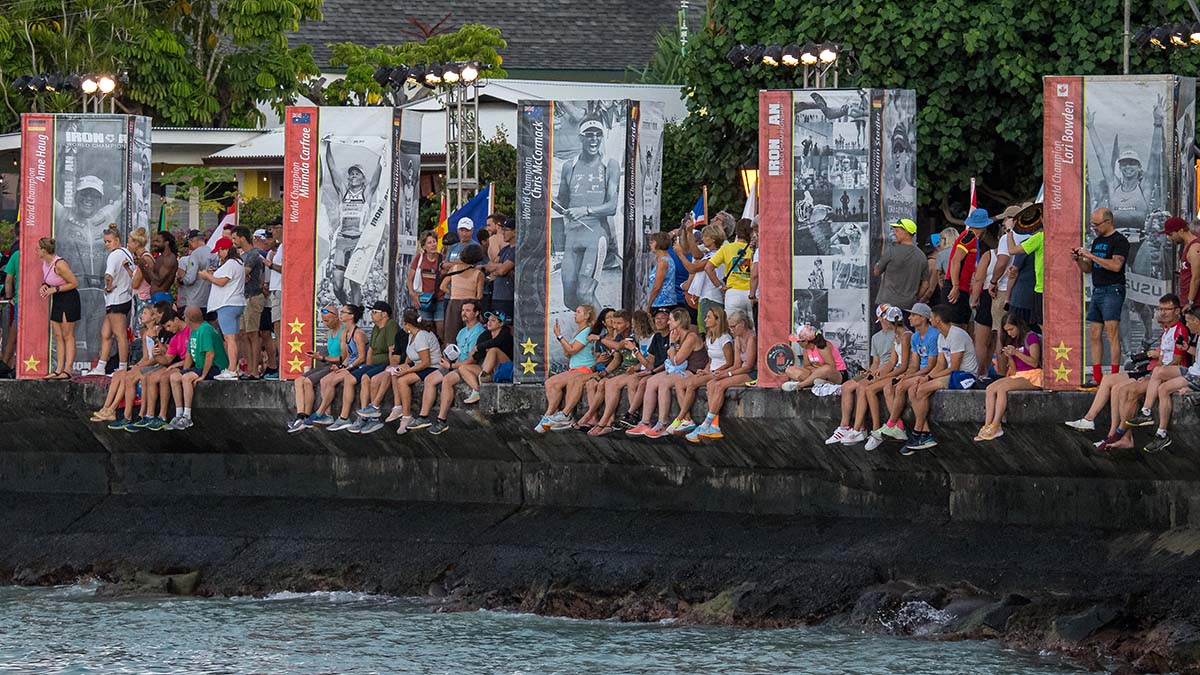 Spectators Sit On The Seawall In Kona During The 2022 World Championships Hawaii