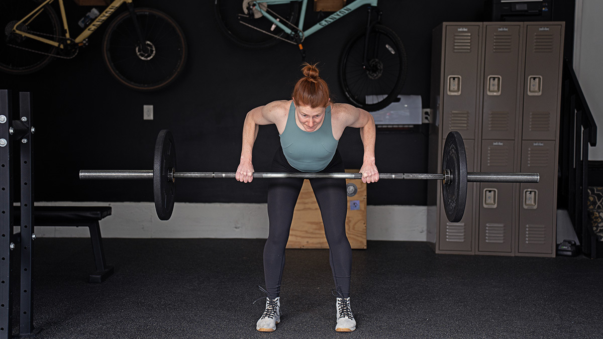 Cycling Athlete In The Gym Performing A Bent Over Row With A Barbell During Strength Training