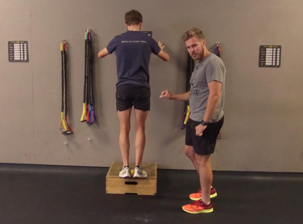 image of heel activation exercise as a hip strengthening exercise for runners